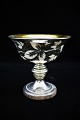 19th century 
bowl on foot in 
poor man's 
silver / 
Mercury Glass 
with leaf 
decorations on 
the ...