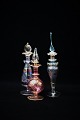 3 decorative, old 1800s perfume bottles in colored glass. Height: 16.5cm. , 14 cm. , & 12.5cm. ...
