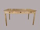 Desk with three drawersAndreas Tuck, burn markOakL: 138 cm, B; 76 cm, H: 73 cm2 extra ...
