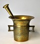 Danish brass 
mortar with 
pestle, 19th 
century. With 
two handles and 
decorations on 
the side. H.: 
...