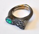Sterling silver oxidized finger ring with opal and brilliant, 20th century Knud Barslund. ...