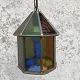 Lamp in lead 
framed glass. 
Yellow/green/blue 
shades. Height 
approx. 26 cm.
Cracks in a 
single ...