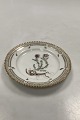 Royal 
Copenhagen 
Privatmalet 
Flora Danica 
Kagetallerken 
No 3552. 
Latinsk Navn: 
Erica Tetralix 
...