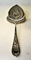Spatula in 
silver with 
Viking 
ornamentation. 
Louis Axel 
Valdemar 
Billing, 
Svendborg, 
Denmark ...