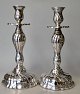 A pair of 
silver-plated 
rococo 
candelsticks, 
20th century 
Denmark. 
Stamped Prima 
Silver. FS, ...