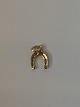 Horse shoe in 
14 karat gold
Stamped 585
Height 15.91 
mm approx
Thickness 1.40 
mm approx
Nice ...