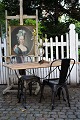 Old French 
bistro table 
with black iron 
base and old 
wooden top with 
a fine patina. 
H:71 cm. ...