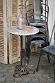 Old French cafe 
table with fine 
cast iron base 
and marble top. 

The table has 
a really nice 
...