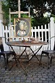 Old garden 
table from the 
South of France 
with raw stone 
top and wrought 
iron base with 
a super ...