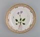 Royal Copenhagen Flora Danica salad plate in hand-painted porcelain with flowers 
and gold decoration. Model number 20/3573.
