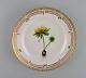 Royal Copenhagen Flora Danica salad plate in hand-painted porcelain with flowers 
and gold decoration. Model number 20/3573.
