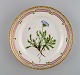 Royal Copenhagen Flora Danica salad plate in hand-painted porcelain with flowers 
and gold decoration. Model number 20/3573.
