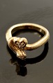 8 carat gold ring size 56 weight 7.7 grams with 2 clear stones in heart motif item no. 510631