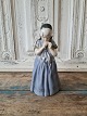 Royal 
Copenhagen 
figure - 
Bornholmerpige 
No. 1323, 
Factory first 
Height 21 cm. 
Design: ...