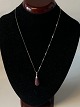 Silver necklace 
with pendant
Stamped 925
Length 43 cm 
approx
The item has 
been checked by 
a ...