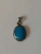 Silver pendant 
with turquoise
Stamped 925
Height 20.94 
mm approx
The item has 
been checked by 
...