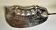 Empire fish 
spade in 
silver, 1837. 
Indistinctly 
stamped. L.: 29 
cm. With 
decorations.
Great ...