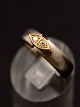 14 carat 
rhodium-plated 
gold ring size 
55-56 weight 
9.5 grams with 
two diamonds 
item no. 511213