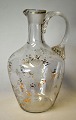 Antique clear 
glass jug with 
etched flowers 
and gilding, 
19th century 
With screw 
handle H.: 14.5 
...