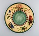 Catherine 
McClung for 
Lenox. "Winter 
greetings". 
Large round 
dish in glazed 
stoneware 
decorated ...