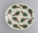 Oval Arabia 
dish in glazed 
stoneware with 
hand-painted 
fir cones. 
Finnish design. 
Dated ...