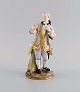 Antique Meissen 
porcelain 
figure. Noble 
gentleman with 
gold watch. 
Late 19th 
century.
Measures: ...