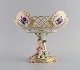 Early and rare 
Royal 
Copenhagen 
compote in 
openwork 
porcelain with 
hand-painted 
flowers and 
gold ...
