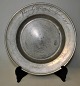 German pewter 
plate, 1796. 
Stamped. On the 
tab 
inscription: 
Johann Gottfrid 
Lanckhals. 
Dia.: 25 cm,