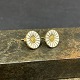 Diameter 1 cm.Classic set of Georg Jensen Daisy ear rings in white.One has a micro defect ...