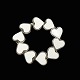 Royal 
Copenhagen / A. 
Michelsen. 
Porcelain and 
Sterling Silver 
Heart Bracelet.
Designed and 
...