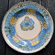 Faience dish, 
18th/19th 
century. 
Polychrome 
decorated with 
fruits and 
flowers. 
Decorated in 
...