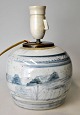 Chinese 
blue/white 
bojan, 19th 
century. 
Converted to a 
lamp. Decorated 
with landscape. 
Signed. ...