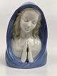 Small porcelain 
bust of Madonna 
with folded 
hands in 
prayer. The 
figure is 
stamped WA with 
crown ...