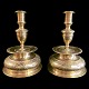 A pair of Baroque candlesticks,made in brass. Germany 1732.  H. 23,2 cm. Diam. 16,4 cm. ...