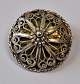 Filigree brooch, approx. 1900. Norway. Stamped AS. Dia.: 3.5 cm.