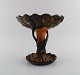 Ipsen's, Denmark. Large and rare art nouveau compote in glazed ceramics shaped like a tree. ...