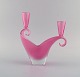 Two-armed 
Murano candle 
holder in pink 
hand-blown art 
glass. Italian 
design, 1960s.
Measures: ...