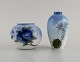 Two Royal Copenhagen vases in hand-painted porcelain with flowers. 1960s.Largest measures: ...