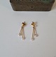 Pair of vintage earrings in 8 kt gold with akoya pearls Stamped 333 Length 3 cm.