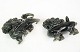 A pair of lions 
made in the 
material jade 
from around the 
1940s. You can 
clearly see the 
fine ...