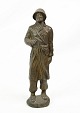 Soldier figure 
of patinated 
metal from 
around the 
1940s. The 
figure also has 
an unknown ...