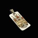 Royal 
Copenhagen / A. 
Michelsen. 
Porcelain and 
Gilded Sterling 
Silver Pendant.
Designed and 
...