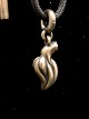 Ole Lynggaard 
sterling silver 
pendant in 
leather strap 
with silver 
ends item no. 
514385
