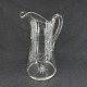 Height 27 cm.Fine glass jug from the 1920s cut with palmettes, crosses and ...
