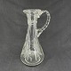 Height 26 cm.Nice jug with a slim neck from the late 1800s.It has a twisted handle, etched ...