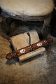 Old French wooden coat rack with fine patina, 3 metal coat hooks, and decorated with 2 old ...