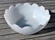 Opaline glass 
bowl, approx. 
1900. With 
decorated edge. 
Previous 
gildings. 
Diameter: 23.5 
cm. ...