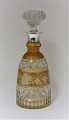 Carafe with 
silver mounting 
(830). Height 
27 cm.