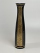 Elegant Art 
Deco glass 
vase, 
1930s-1940s. 
Black/burgundy 
with gold.
The vase 
appears black, 
...