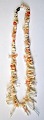 Coral necklace, 20th century. With light, bright red corals. L.: 56 cm.